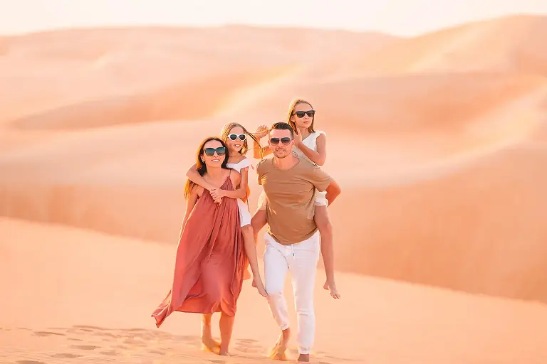 Family enjoying a Dubai desert safari