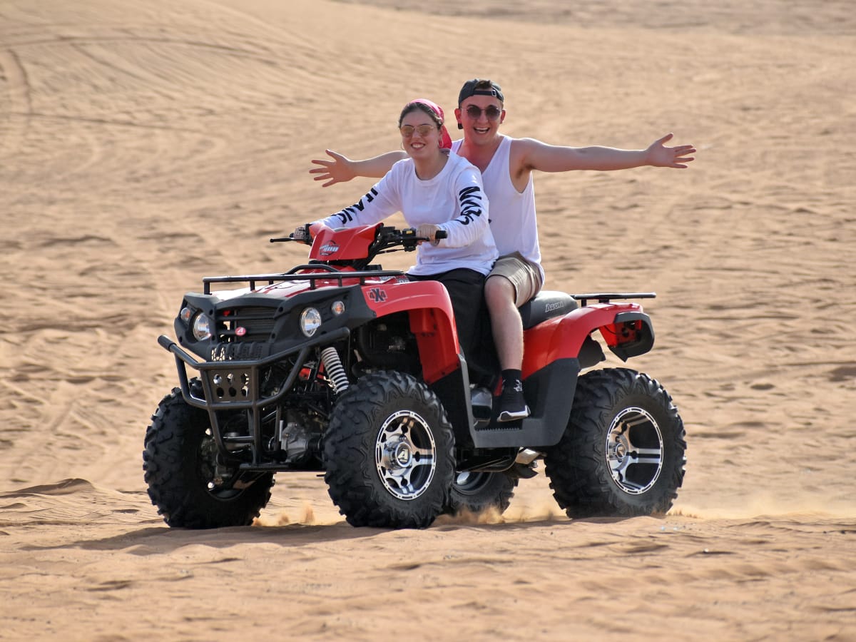 Couple enjoying Quad Biking in Dubai